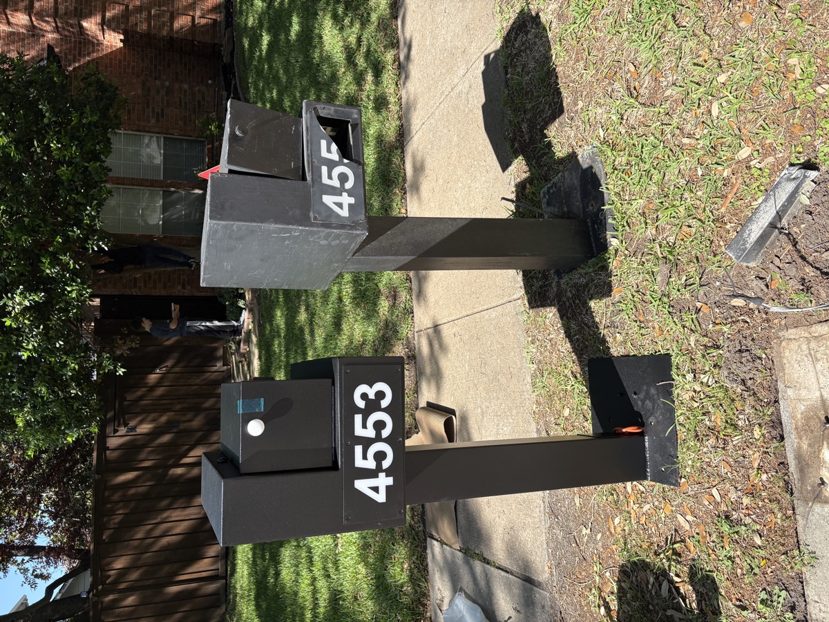 Two Deerfield mailboxes on the street showing typical neighborhood setup